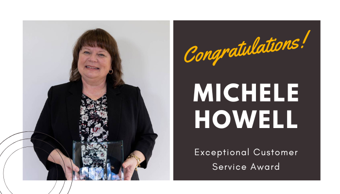 michele howell holding her award / congratulations customer service