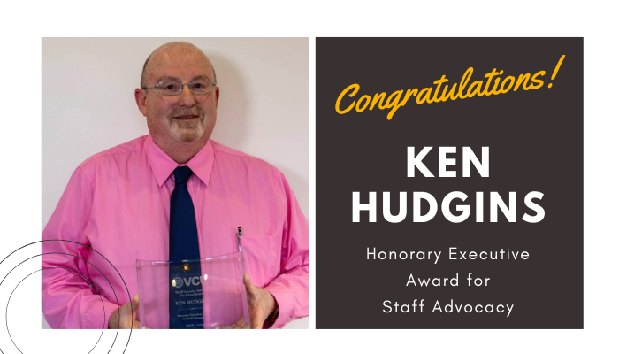 ken hudgins holding his award