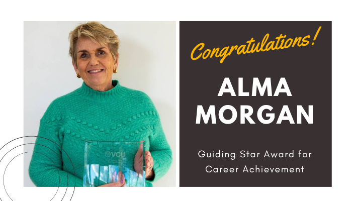 alma morgan holding her award / congratulations alma morgan guiding star