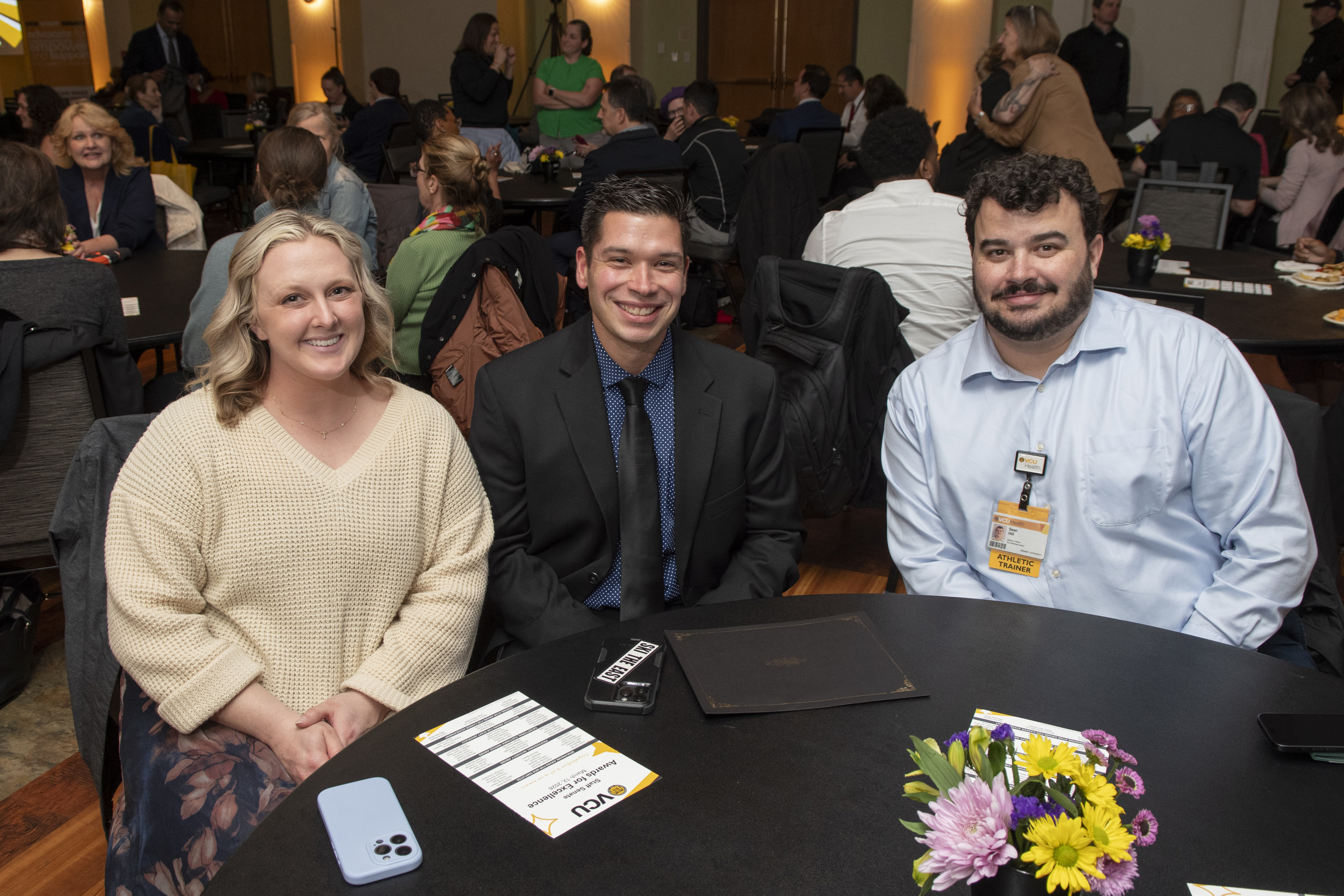 Attendees sitting around a table