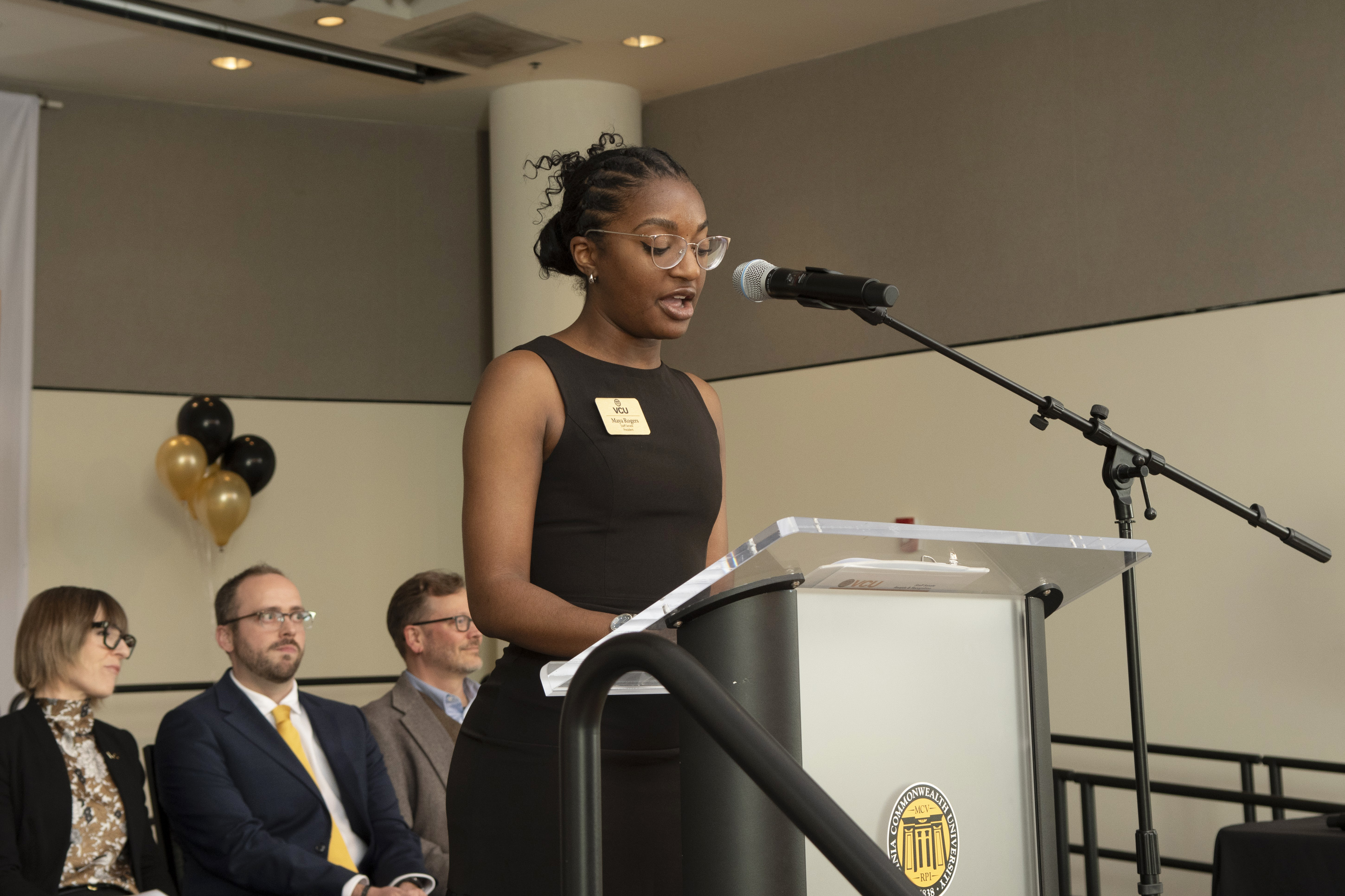 Maya Gibson speaking to audience