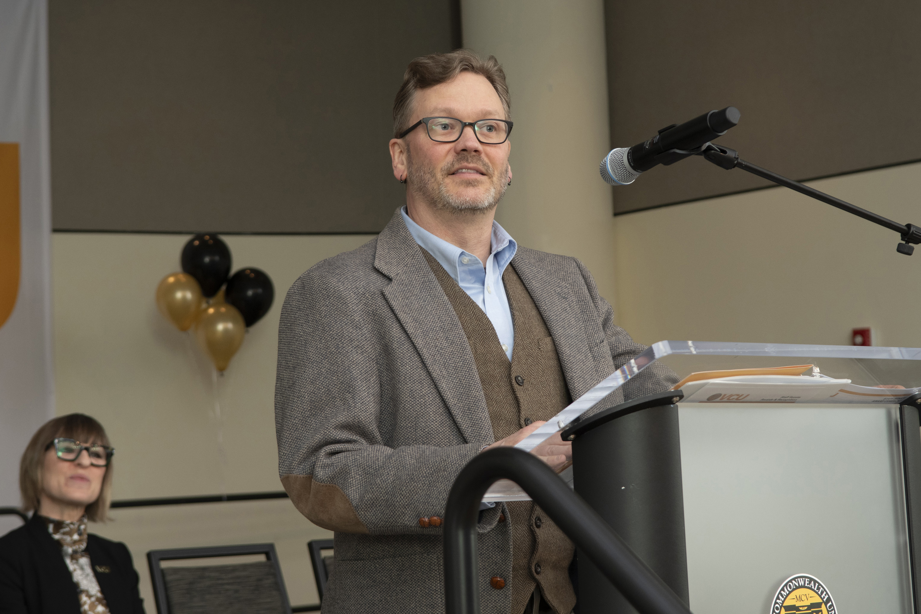 Speaker addressing audience